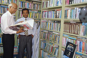 Chairman of NCRBD, Dr. A K Abdul Mubin, with Dr. M Helal in the Campus Library (2009)