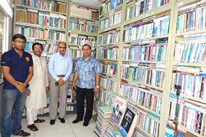 Dean of Business Studies Faculty of Dhaka University, Professor Shibli Rubayat Ul Islam and Chairman of Education Development Association, Haider Ahmed Khan with Dr. M Helal in the Campus Library (2014)