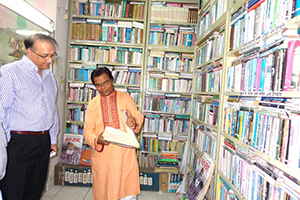 President of REHAB, Mukarram Hussain Khan with Dr. M Helal in the Campus Library (2014)