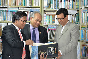 Managing Director of Agrani Bank, Md. Shams-Ul Islam with Dr. M Helal in the                Campus Library (2015)