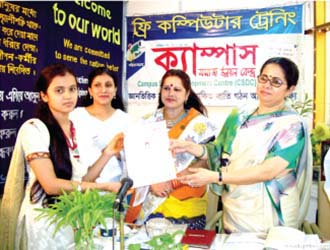 Advisor of former Caretaker Government Mrs. Rasheda  K Chowdhury and Ward Commissioner Mrs. Shirin Rukhsana are giving certificates to computer trainees (2011)