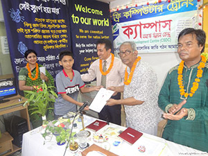 Founder of University Press Ltd. Mr. Mohiuddin Ahmed is giving Certificates to the Trainees of Free Computer Training (Batch 121) as Chief Guest; Dr. M Helal is presiding over. (2013)