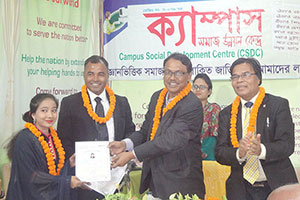 Managing Director of ICB, Kazi Sanaul Hoq, is giving Certificates to the Trainees of Free Computer Training (Batch 132) as Chief Guest; Dr. M Helal is presiding over. (2015)