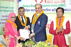 Vice-President of REHAB, Md. Anwaruzzaman is giving Certificates to the Trainees of Free Computer Training (Batch 140) as Chief Guest; Secretary-General of CSDC, Dr. M Helal, presides over. (2017)