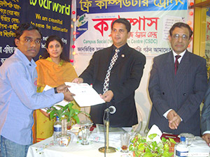 Founder Chairman of Cambrian School & College, Ln. M. K. Bashar PMJF is giving Certificates to the Trainees of Free Computer Training (Batch 80) as Chief Guest; Dr. M Helal is presiding over. (2008)