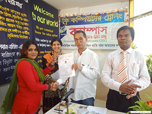 Founder-Chairman of Freedom Fighter Trust, Mr. Akku Chowdhury, is giving Certificates to the Trainees of Free Computer Training (Batch 116) as Chief Guest; Dr. M Helal is presiding over. (2013)