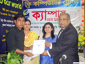 Muhammad A (Rumee) Ali, Chairman of BRAC Bank and Former Vice Chairman of Bangladesh Association of Banks, and Farzanah Chowdhury, MD of Green Delta Insurance, are presenting certificates to Trainees of Free Computer Training (Batch 82); Dr. M Helal is presiding. (2009)