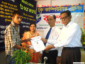 Hon. Minister of Social Welfare Ministry, Mr. Enamul Haque Mostofa Shahid is  giving Certificates to the Trainees of Free Computer Training (Batch 86) as Chief Guest; Dr. M Helal presides over. (2009)