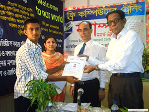 Hon. Minister of Social Welfare Ministry, Mr. Enamul Haque Mostofa Shahid is  giving Certificates to the Trainees of Free Computer Training (Batch 86) as Chief Guest; Dr. M Helal presides over. (2009)