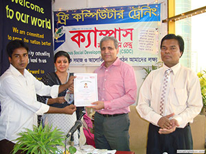 President of BGMEA, Mr. Shafiul Islam Mohiuddin, is giving Certificates to the Trainees of Free Computer Training (Batch 112) as Chief Guest; Dr. M Helal is  presiding over. (May 2011)