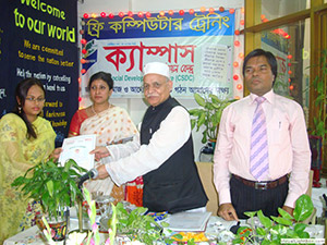 Hon. Land Minister Rezaul Karim Hira gives Certificates to the Trainees of Free Computer Training (Batch 93) as Chief Guest; Dr. M Helal is presiding over. (2009)