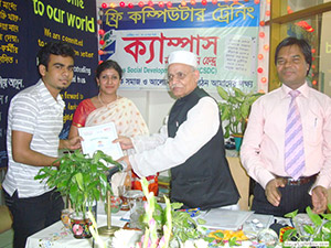 Hon. Land Minister Rezaul Karim Hira gives Certificates to the Trainees of Free Computer Training (Batch 93) as Chief Guest; Dr. M Helal is presiding over. (2009)