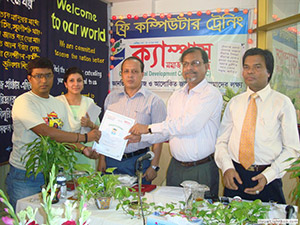 Press Secretary of Prime Minister, Freedom Fighter AKM Shamim Chowdhury is giving Certificates to the Trainees of Free Computer Training (Batch 92) as Chief Guest; Dr. M Helal presides over. (2009)