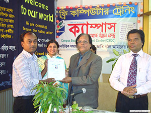 Chairman of Eastern University, Prof. Dr. Saiful Majid Khan, is giving Certificates to the Trainees of Free Computer Training (Batch 95) as Chief Guest; Dr. M Helal is presiding over. (2009)