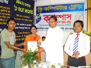 President of Jatiyo Shomajtantrik Dol, Mr. Hasanul Haque Enu, is giving Certificates to the Trainees of Free Computer Training (Batch 104) as Chief Guest; Dr. M Helal is presiding over. (2010)