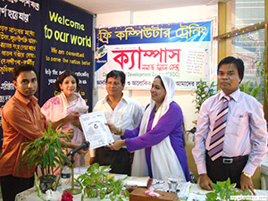 Parliament Member Asma Jerin Jhumu MP and Principle of Lalbagh Model College, Jahangir Alam, is giving Certificates to the Trainees of Free Computer Training (Batch 104) as Chief Guest; Dr. M Helal is presiding over. (2010)