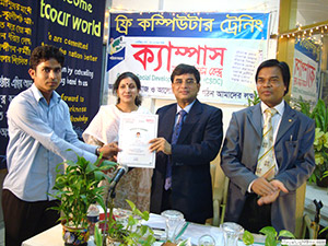 Secretary of Ministry of Youth & Sports, Mahbub Ahmed, is giving Certificates to the Trainees of Free Computer Training (Batch 107) as Chief Guest; Dr. M Helal presides over. (2010)