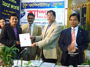 Vice-chairman of EPB, Mr. Jalal Ahmed and Founder of Modern Herbal, Dr. Alamgir Moti, is giving Certificates to the Trainees of Free Computer Training (Batch 108) as Chief Guest; Dr. M Helal is presiding over. (2010)