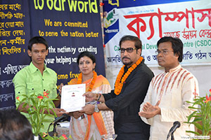 Chairman of Northern University, Prof. Dr. A Y M Abdullah, is giving Certificates to the Trainees of Free Computer Training (Batch 120) as Chief Guest; Dr. M Helal is presiding over. (2013)