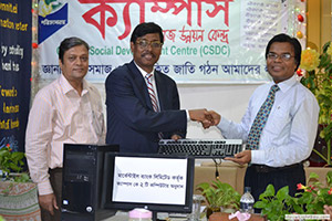 AMD of Mercantile Bank Ltd., Mr. Monindra Kumar Nath is giving Computer for Free Computer Training of Campus Social Development Center. (2013)