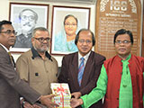 Dr. M Helal is handing over Creative Books and Models of Campus Publications to the Chairman of UCC, Md. Abdul Halim Patwary. (2018)