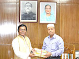 Dr. M Helal is handing over Creative Books and Models of Campus Publications to                     Information Secretary Abdul Malek. (2018)