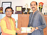 Dr. M Helal is handing over Creative Books and Models of Campus Publications to the Mayor of Dhaka North City Corporation, Atiqul Islam (2018)