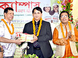 Additional Secretary of Agriculture Ministry, Mohammad Jakir Hossain, is handing over    Creative Books and Models of Campus Publications to Founder of Cambrian                  Education Group, Lion M K Bashar. Next to him Dr. M Helal. (2017)