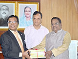 Dr. M Helal is handing over Creative Books and Models of Campus Publications to Civil Aviation and Tourism Minister AKM Shahjahan Kamal. (2019)