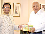 Dr. M Helal is handing over Creative Books and Models of Campus Publications to the Chairman of Apex Group, Syed Manzur Elahi. (2019)