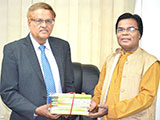 Dr. M Helal is handing over Creative Books and Models of Campus Publications to Founder Vice-Chancellor of Asian University, Dr. Abul Hasan M. Sadeq (2017)