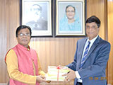 Dr. M Helal is handing over Creative Books and Models of Campus Publications to Chairman of Bangladesh Securities and Exchange Commission, Professor M Khairul Hossain (2018)