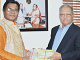 Dr. M Helal is handing over Creative Books and Models of Campus Publications to the Chairman of RTV & Bengal Group, Morshed Alam. (2018)